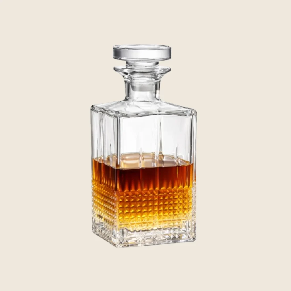 Exclusive whiskey decanter by Bormioli Rocco Bartender 750ml premium square whiskey decanter with a diamond-cut body and airtight silicone-tipped stopper.