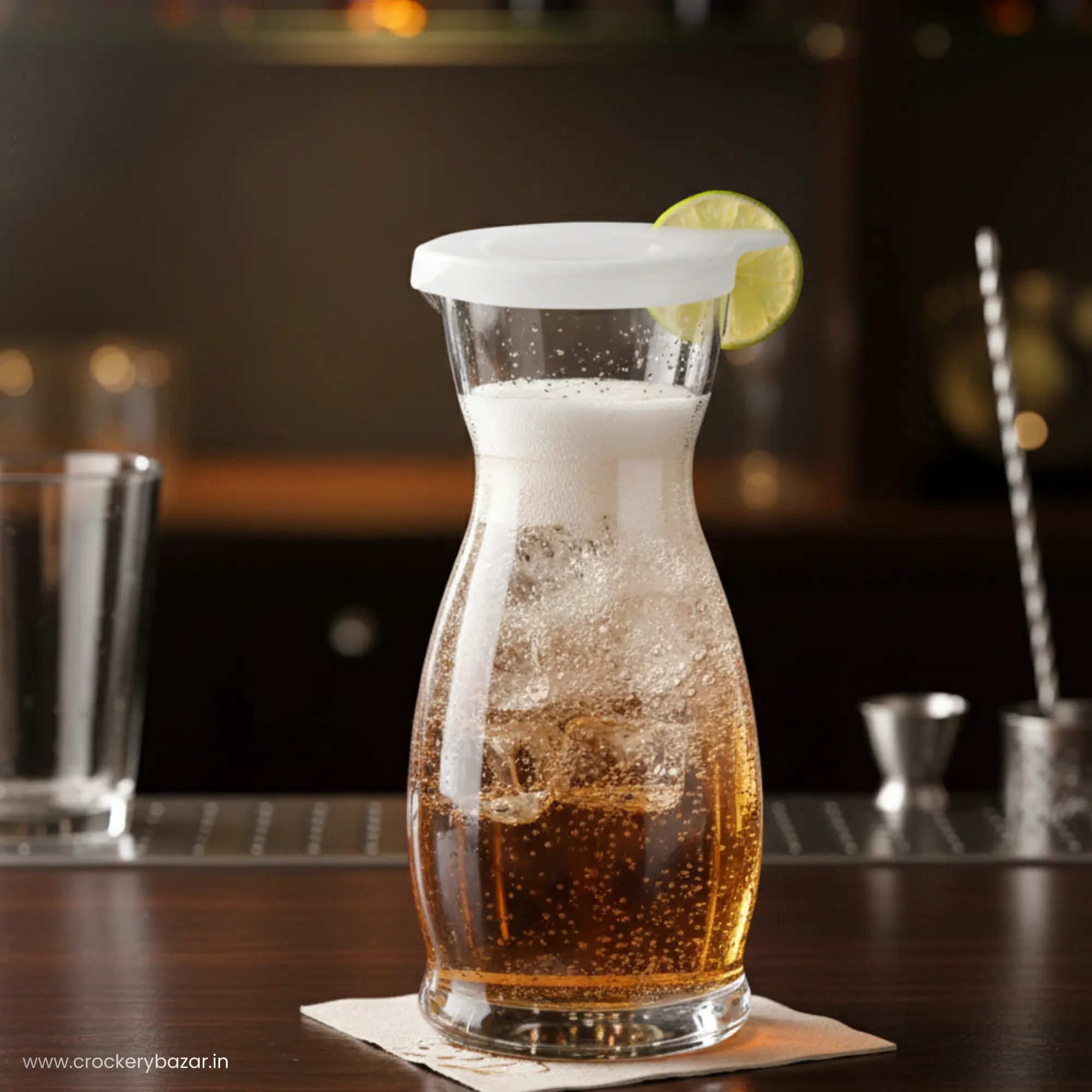 Borgonovo Indro 500ml carafe with a white lid and lime garnish serving a carbonated beverage in a bar setting.