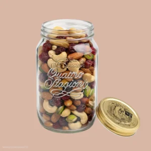 Bormioli Rocco Quattro Stagioni 1500ml clear glass jar filled with dry fruits and golden lid