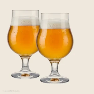 A pair of Nadir Dublin 400ml stemmed pot belly beer glasses filled with golden lager and a rich foamy head.