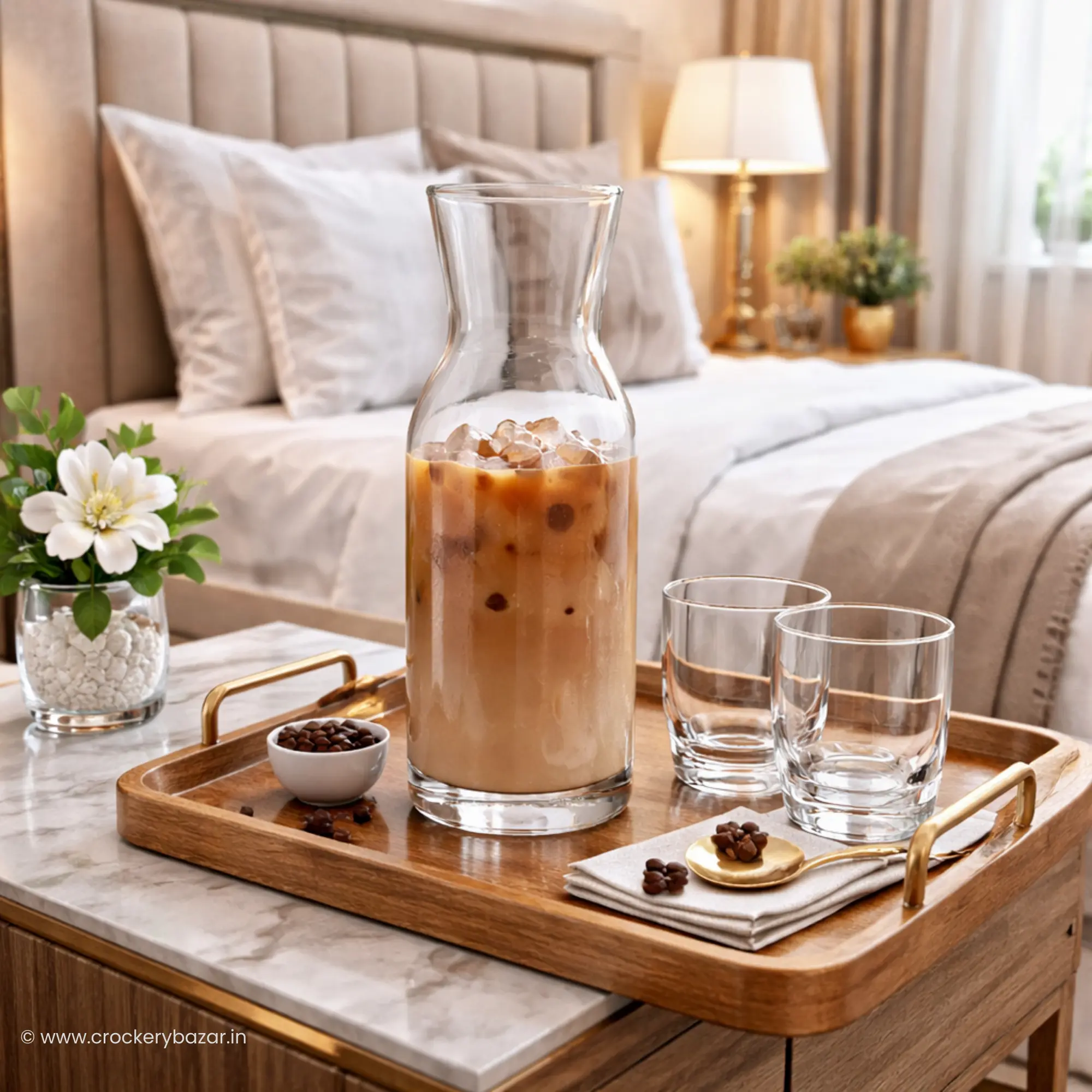 Bormioli Rocco Aquaria 750ml bedside glass carafe with iced coffee on a luxury marble nightstand tray.
