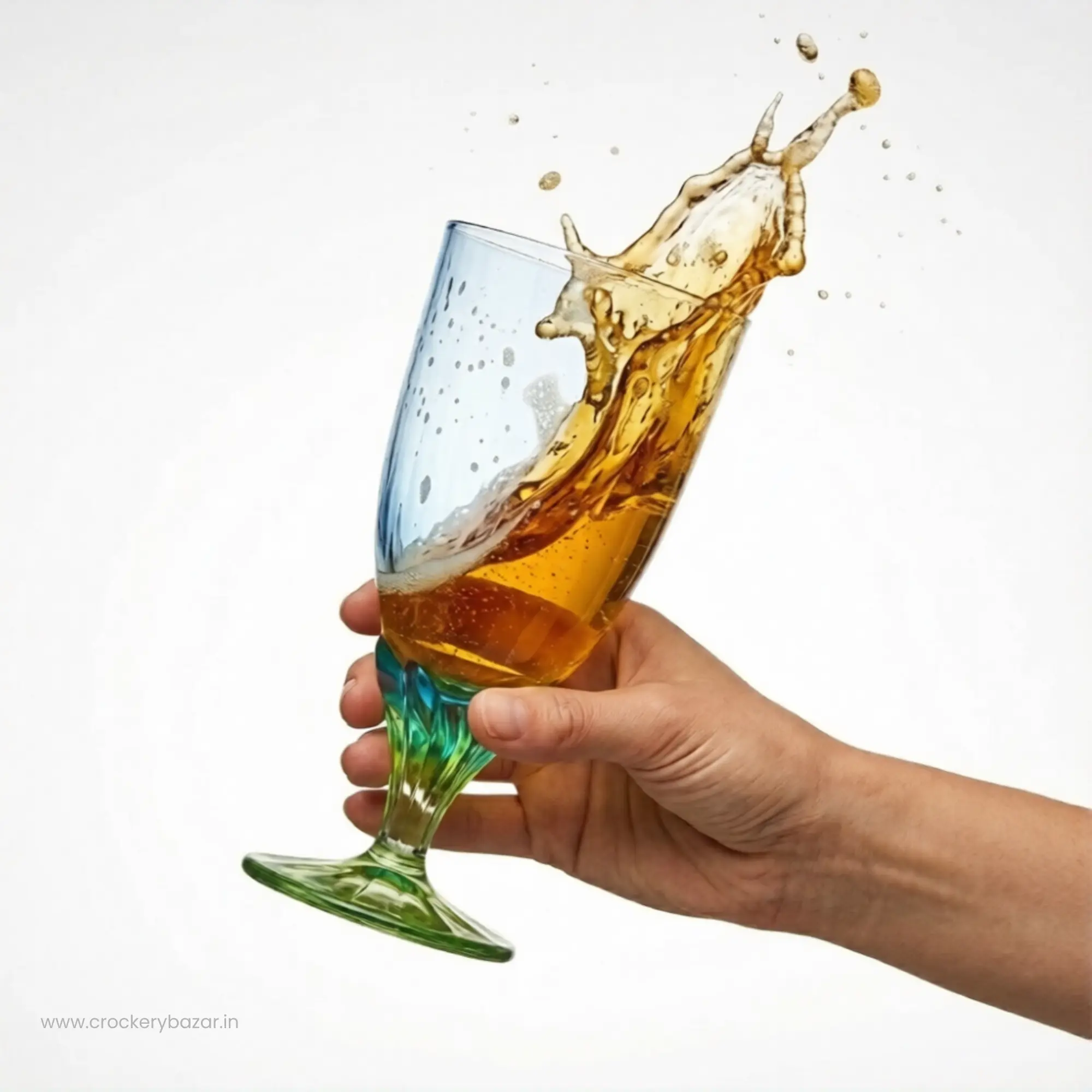 Hand holding Bormioli Rocco Bahia glass with beer splash - Premium beer glasses set of 2