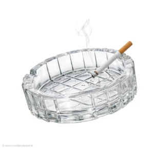 Premium glass ashtray by Bormioli Rocco in a large 15cm size, featuring a thick grid-patterned Italian glass design with a lit cigarette resting in one of its two placement ports.