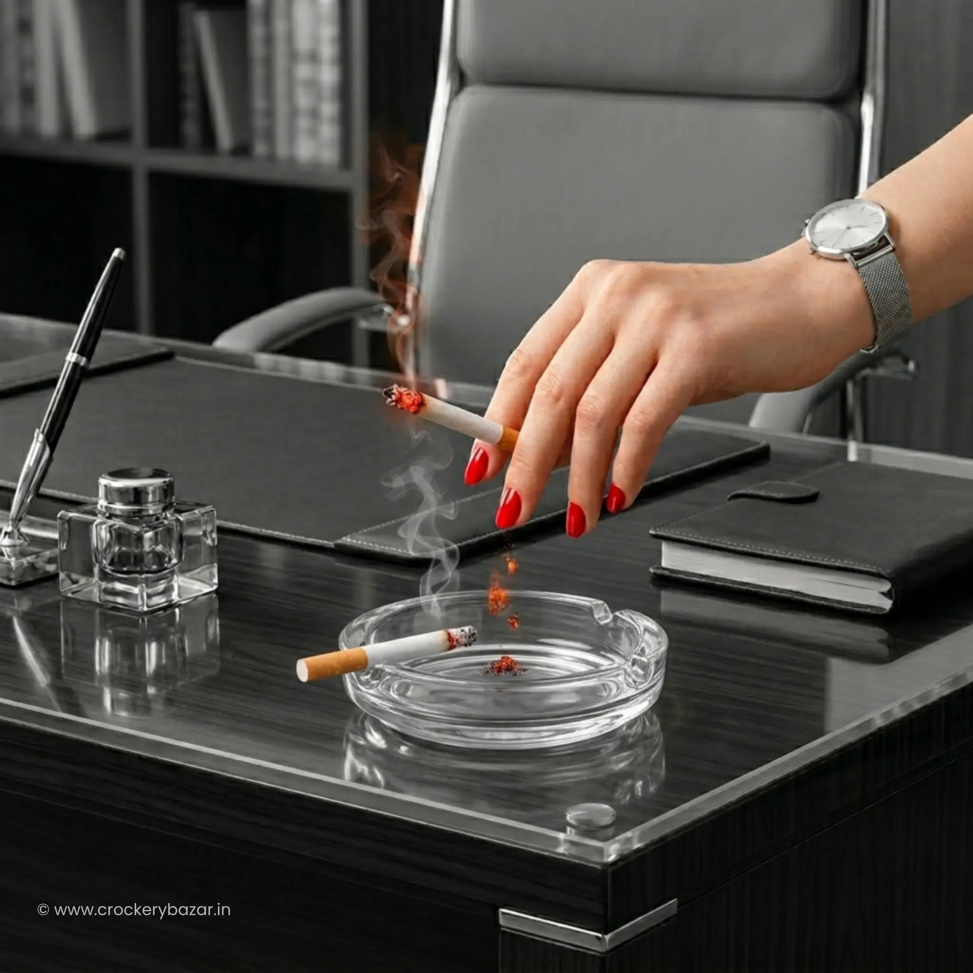 Bormioli Rocco Poker Italian glass ashtray on a modern executive office desk lifestyle setting.