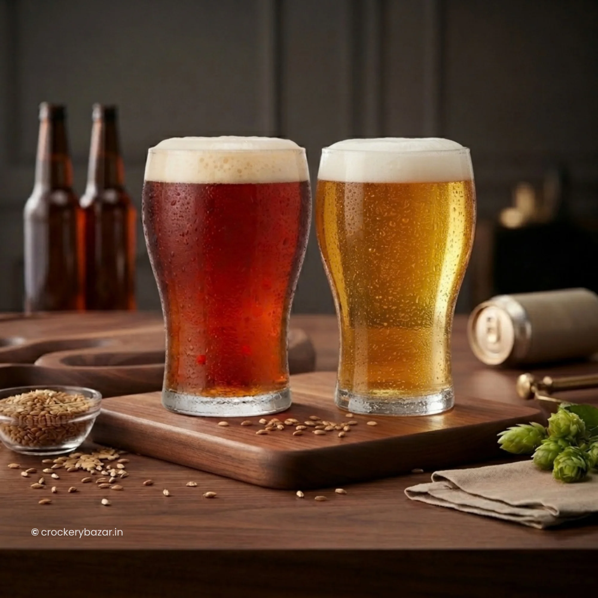 Luminarc beer glasses filled with lager and ale on wooden board
